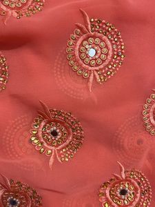 Coral And Blue Georgette Heavy Work Saree