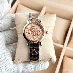 Guess Women's Rose Gold Tone Watch