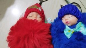 3 Cute Baby Doll Pompom Keychain