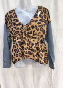 46209. Leopard Print Peplum Top