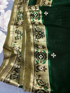 Elegant Green Saree with Gold Border