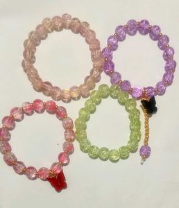 Purple Beaded Bracelet with Bear Charm