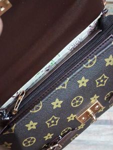 Stylish Brown Crossbody Bag with Monogram Strap