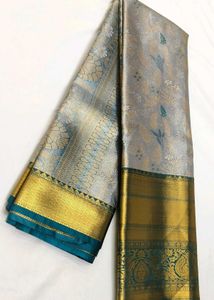 Exquisite Grey Silk Saree with Gold Border