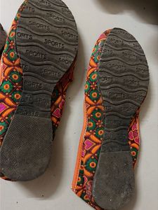 Embroidered Juttis with Pom-Poms