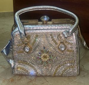 silver solid hand bag