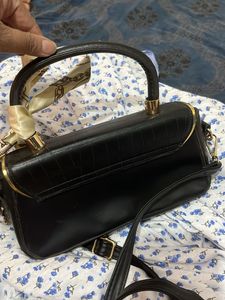 pure leather branded hand bag