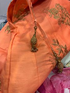 Stunning Orange Embroidered Lehenga Choli