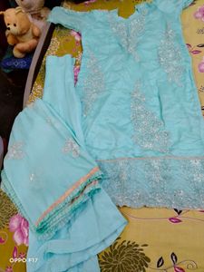 stitched suit with zipper storage  packet.