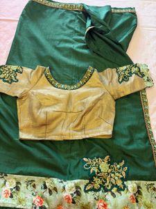Elegant Green Saree with Floral Border