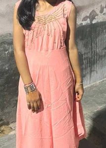 Elegant Pink Kurta Set with Embellished Neckline