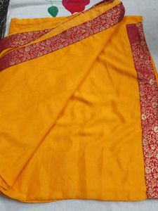 Vibrant Yellow Saree with Red Border