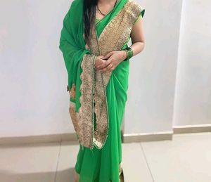 Elegant Green Saree with Golden Border