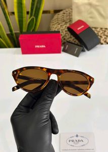PRADA SUNGLASSES*( COPY)*ORIGINAL SHOWROOM ARTICLE
