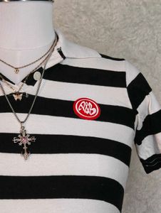 Women's black and white striped polo tee