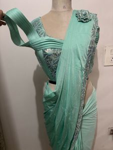 Elegant Mint Green Saree with Embellished Blouse