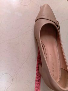 Elegant Nude Heels with Bow Detail