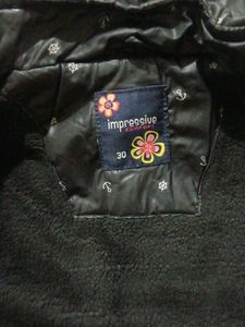 Chic Black Puffer Jacket with Anchor Print