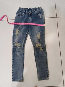 Distressed Blue Denim Jeans
