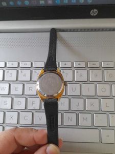 Vintage Gold Tone Watch with Black Leather Strap