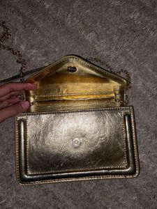 MANGO Gold sling Bag