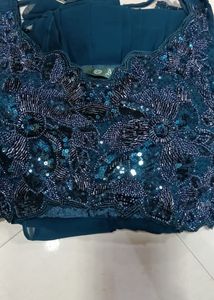 Exquisite Teal Sequined Lehenga Set