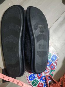 Cozy dark blue knitted slippers