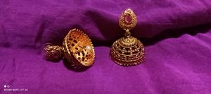 Elegant Gold Jhumka Earrings with Pink Stone
