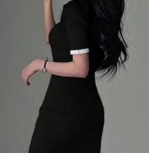 Chic Black Ribbed Polo Dress