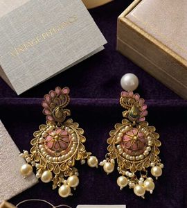 Elegant Peacock Dangle Earrings