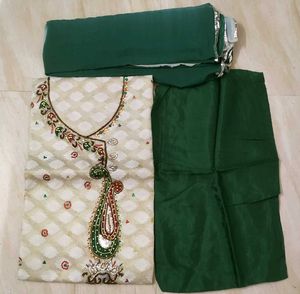 cream and green embroidery suit