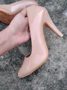 Elegant Nude Patent Leather Stilettos