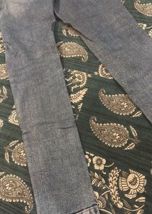 Distressed Blue Denim Jeans