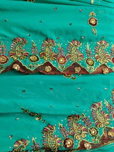 Stunning Embellished Teal Saree