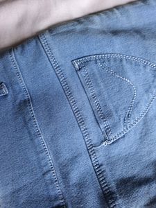 High-Waisted Frayed Hem Jeans