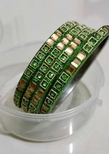 brand new Sparkling Green &amp; Gold Bangles