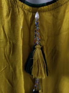 Stylish Yellow Kurti with Tassel Detail