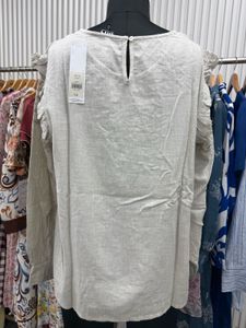 beige long sleeve embroidery top
