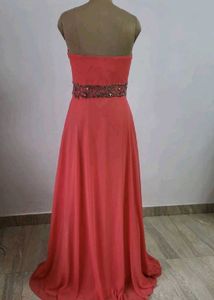 Elegant Strapless Coral Gown with Embellished Wais