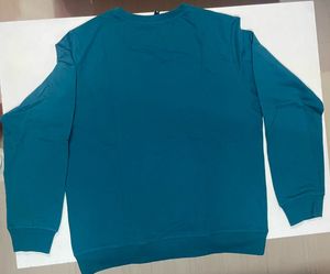 Teal "Fly Away" Paper Plane Sweatshirt