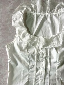 White Ruffled Neck Sleeveless Top