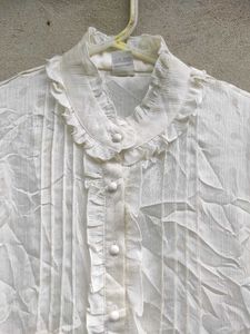 Elegant White Ruffled Blouse