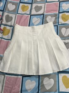 white mini pleated skirt