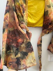 SASSAFRAS Chic Floral Tie-Front Cropped Blouse