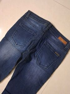 Women's Blue Flared Jeans with Embellishments