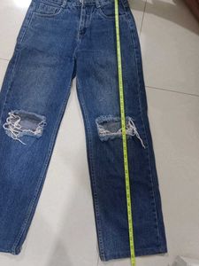 Ripped Knee Blue Jeans