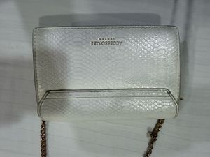 accesorize london sling bag