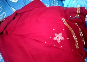 Elegant Red Saree with Floral Detail