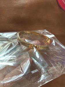 Gold Bangle with Crystal Embellishments