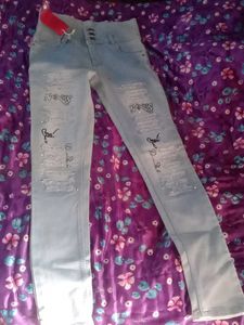 Stylish Ripped Jeans with Embellishments